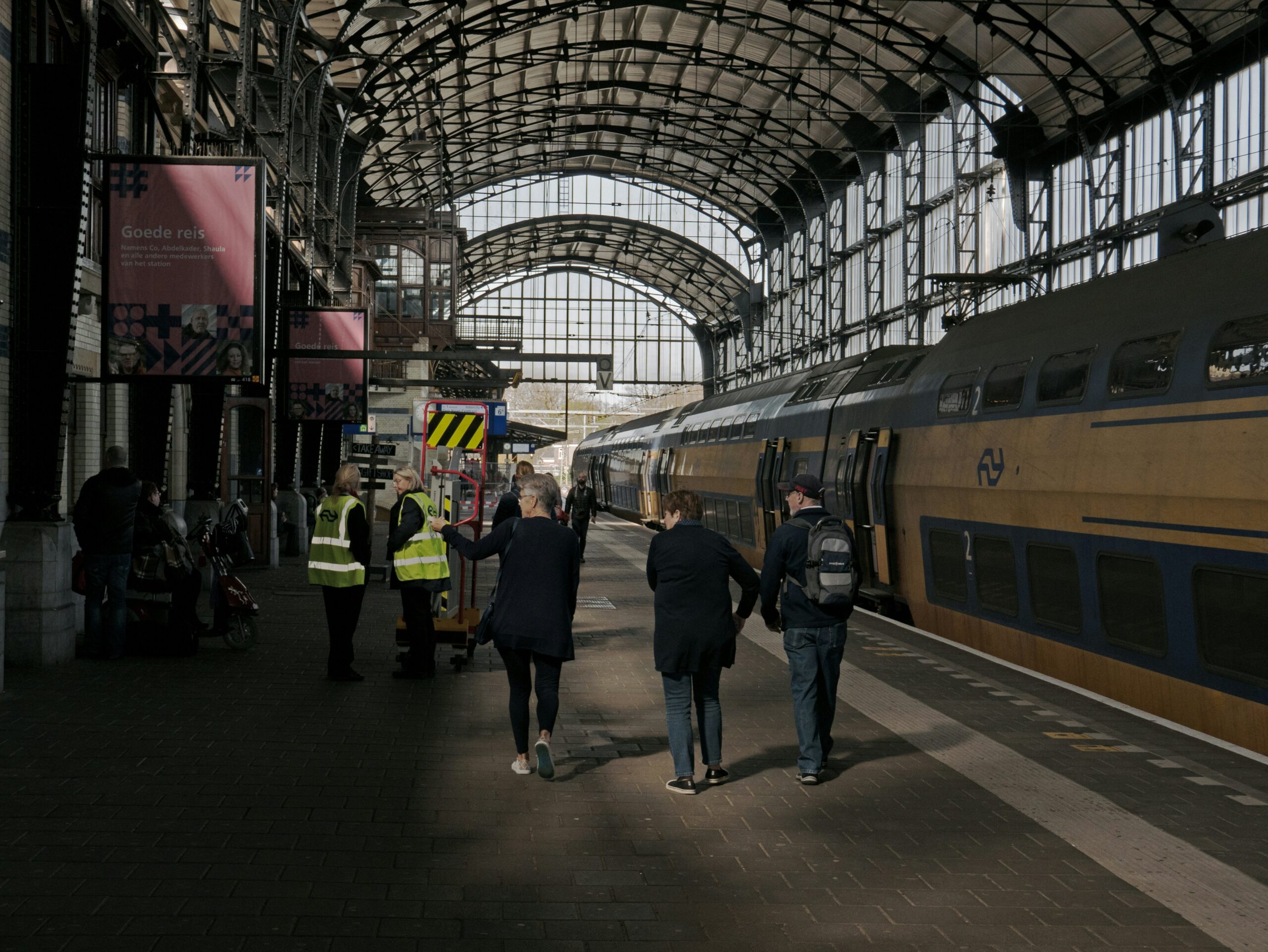 Interior view of Louth's historic railway station, featuring Victorian-era architecture with arched windows, high ceilings, and old brickwork, now repurposed but retaining its vintage charm.